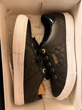 GUESS Black Quilted Sneakers with Gold Accents and White Sole